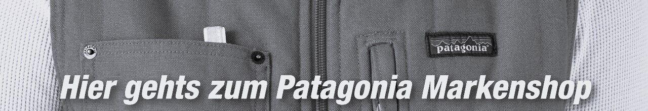 Detailansicht einer Outdoor-Weste von Patagonia mit Markenlogo und Reißverschluss – Jetzt zum Patagonia Markenshop.