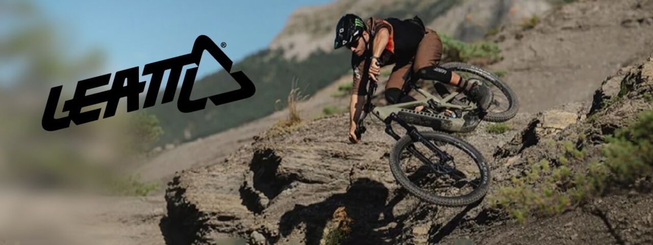 Mountainbiker in Leatt Gear beim Downhill-Ride über felsiges Terrain – kompromissloser Schutz und volle Kontrolle im Gelände.