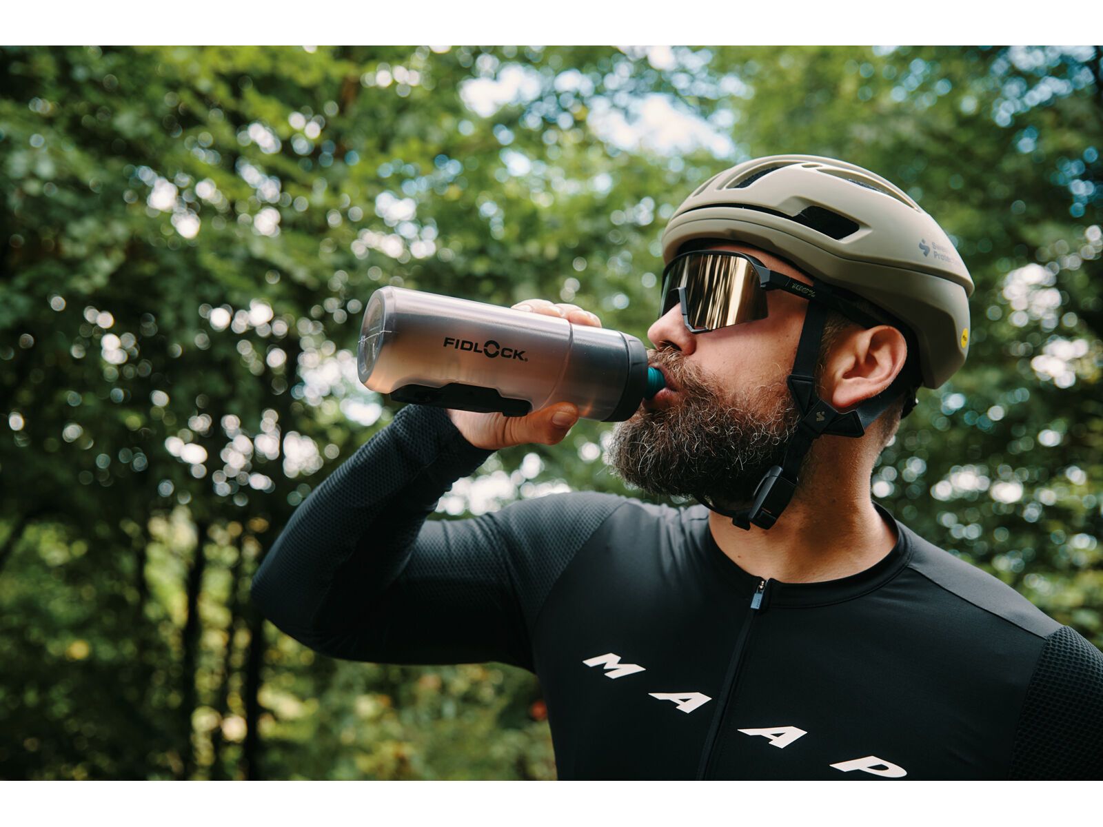 Fidlock Twist Bottle 600 Antibacterial + Bike Base, transparent black/light green - Bild 15